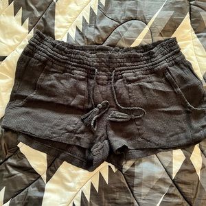 Roxy black beach shorts. Drawstring. XL, but runs small. Like new condition!